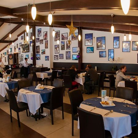 Kapriz Karakol Hotel Bagian luar foto