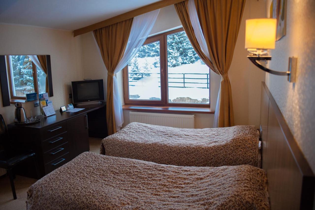 Kapriz Karakol Hotel Bagian luar foto