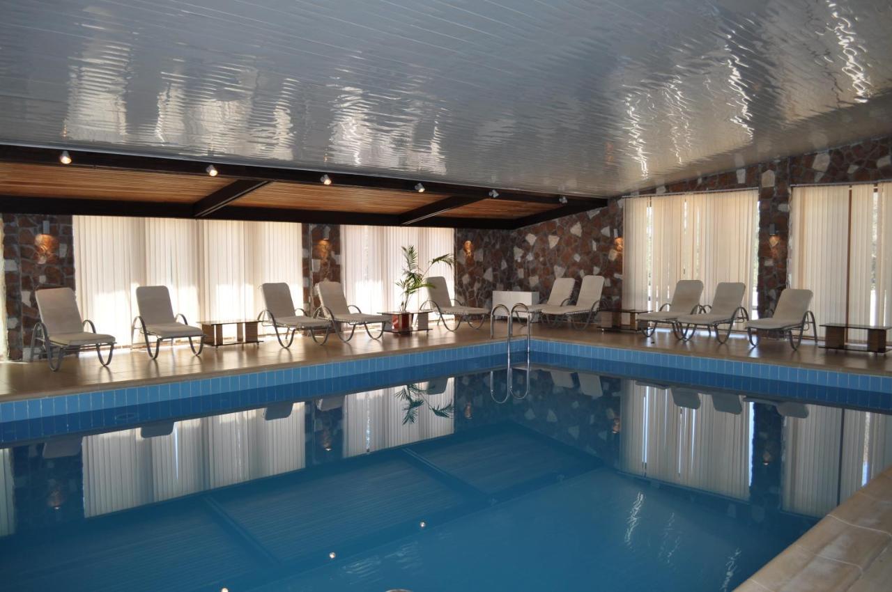 Kapriz Karakol Hotel Bagian luar foto