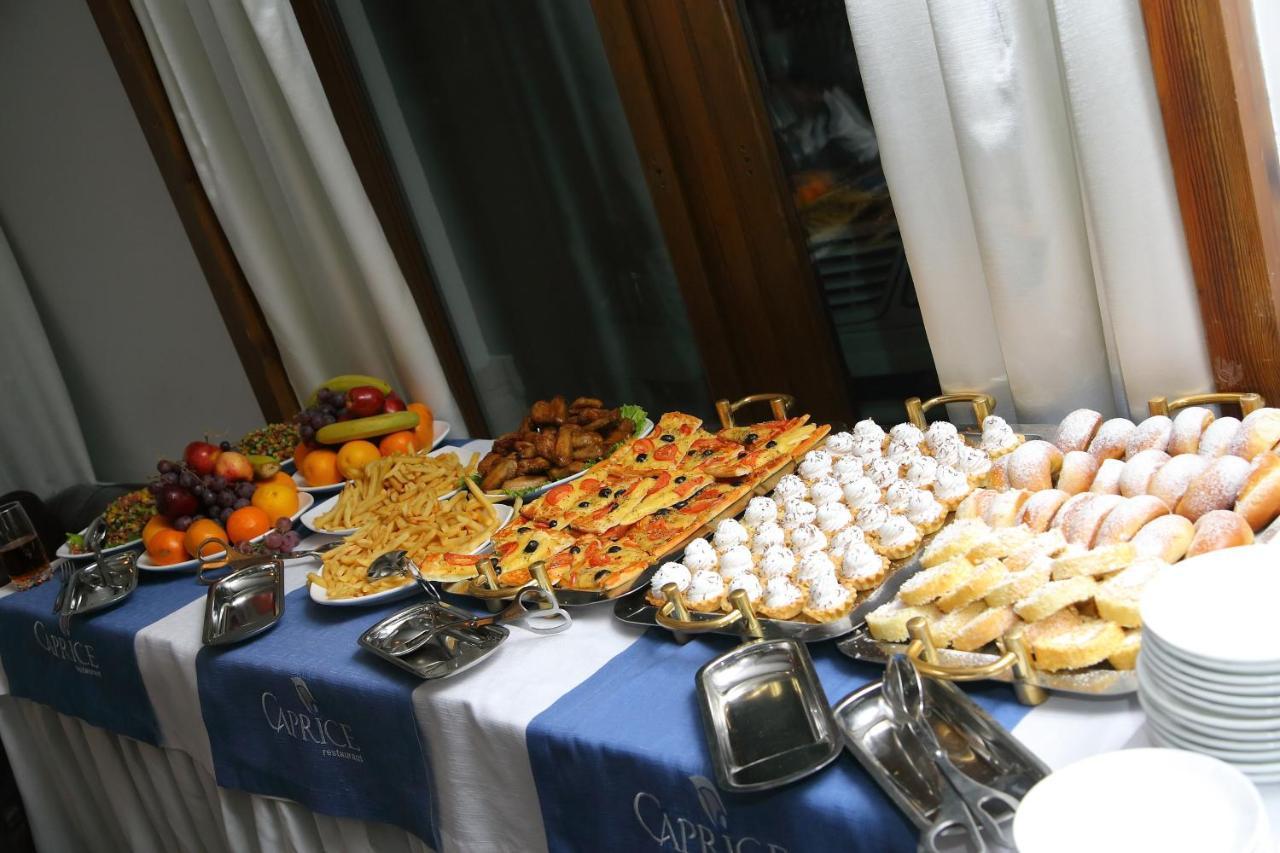 Kapriz Karakol Hotel Bagian luar foto