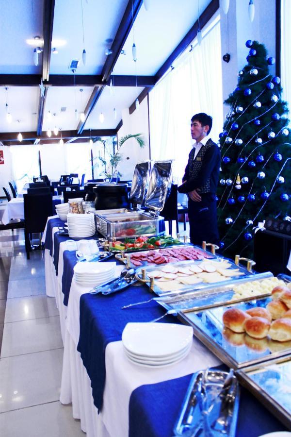 Kapriz Karakol Hotel Bagian luar foto